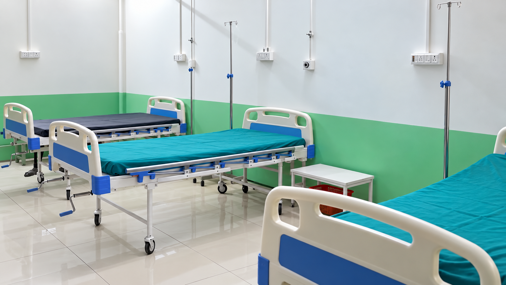 Clean patient ward with hospital beds